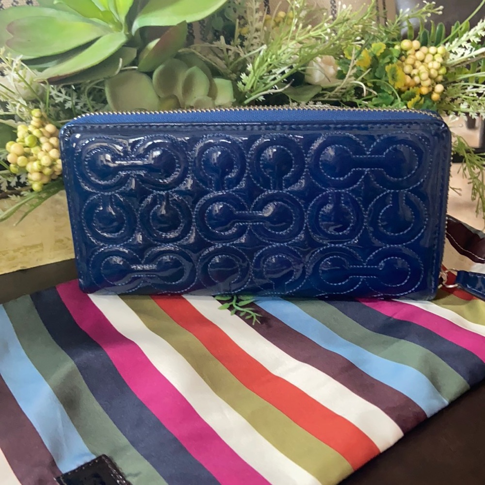COPY - Women’s patent  leather Coach long zip wallet.